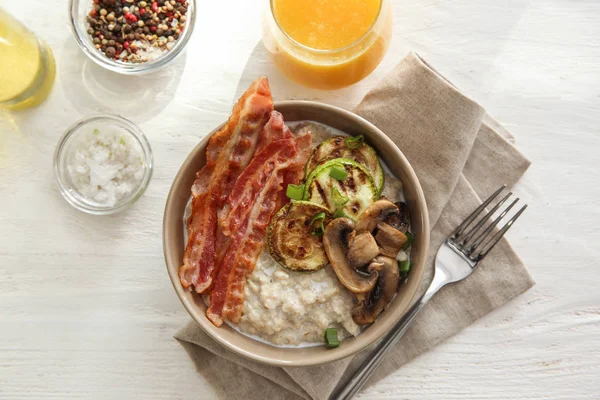 Bowl Tasty Oatmeal Fried Bacon Mushroom Squash Wooden Table — Stock Photo, Image