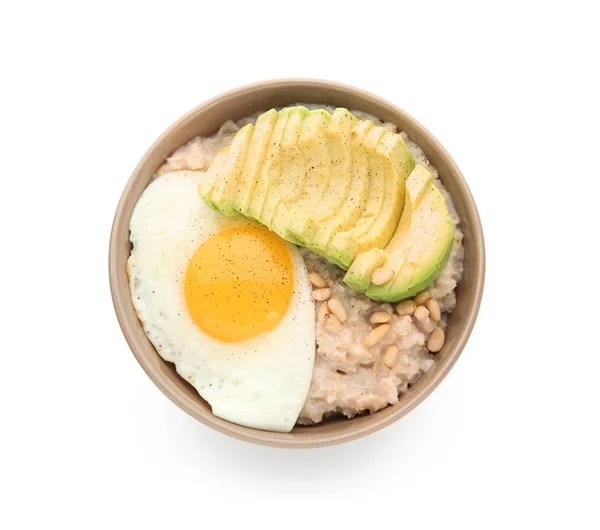 Bowl Delicious Oatmeal Egg Avocado White Background — Stock Photo, Image