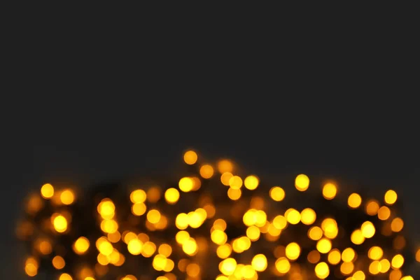 Glowing Christmas Lights Dark Background Blurred View — Stock Photo, Image