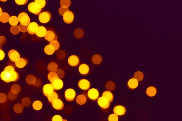 Leuchtende Weihnachtsbeleuchtung Auf Dunklem Hintergrund Verschwommene Sicht — Stockfoto