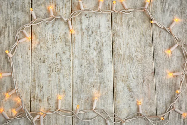 Frame Made Beautiful Bright Christmas Garland Wooden Background — Stock Photo, Image