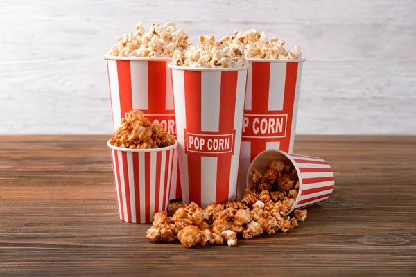 Cups Tasty Popcorn Wooden Table — Stock Photo, Image