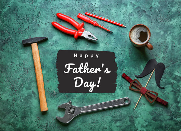 Composition with set of tools and cup of coffee on color background. Happy Father's Day celebration