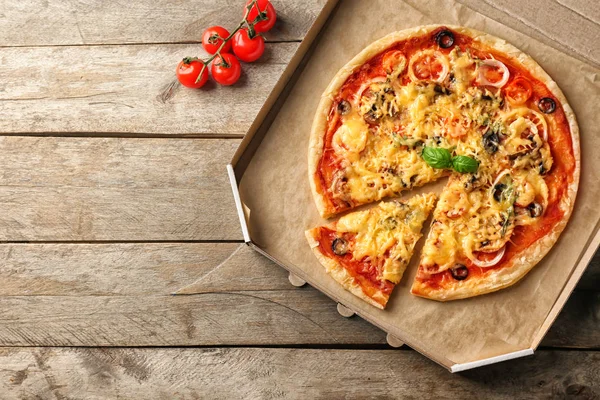Tasty Pizza Cardboard Box Wooden Table Top View — Stock Photo, Image