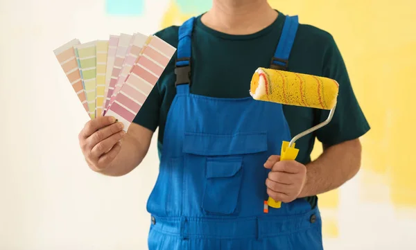 Male Painter Uniform Color Palette Samples Roller Brush Colorful Background — Stock Photo, Image