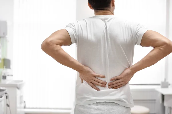 Man Suffering Back Pain Orthopedist Office — Stock Photo, Image