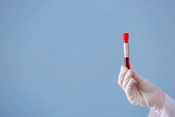 Lab Worker Holding Test Tube Blood Sample Color Background — Stock Photo, Image