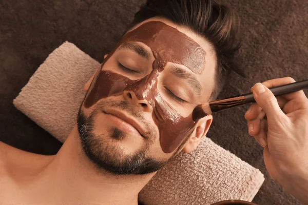 Beautician Applying Cosmetic Mask Man Face Spa Salon — Stock Photo, Image