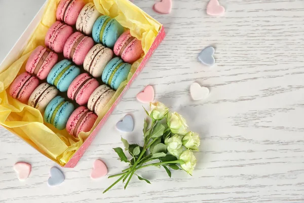 Box Tasty Macarons Roses Light Background Top View — Stock Photo, Image