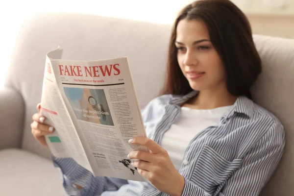 Young Woman Reading Newspaper Indoors — Stock Photo, Image