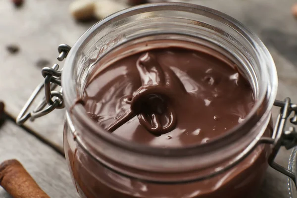 Jar Molten Chocolate Closeup — Stock Photo, Image