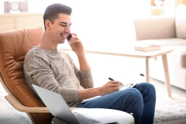 Young Freelancer Talking Phone While Working Home — Stock Photo, Image