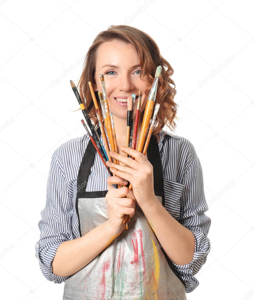 Female artist with brushes on white background