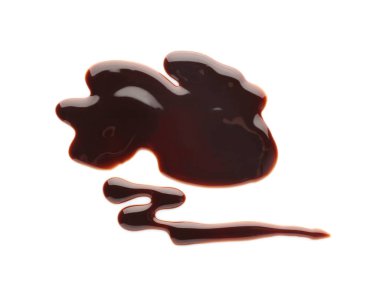 Beyaz zemin üzerine çikolata şurubu