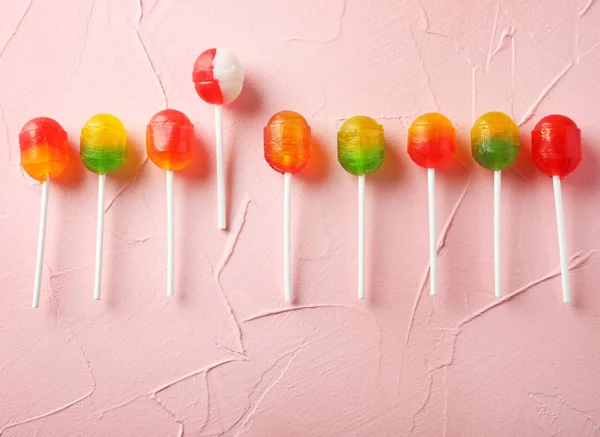 Lollipops Saborosos Cor Fundo Texturizado — Fotografia de Stock