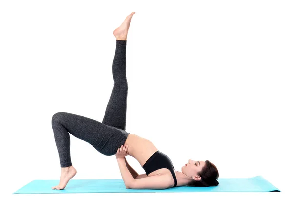 Mujer Joven Practicando Yoga Sobre Fondo Blanco —  Fotos de Stock
