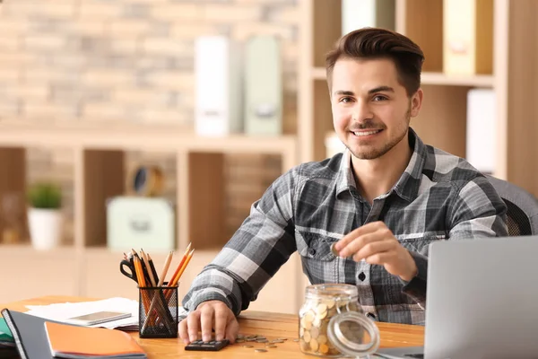 Young Man Counting Money Table Indoors — Stock Photo, Image