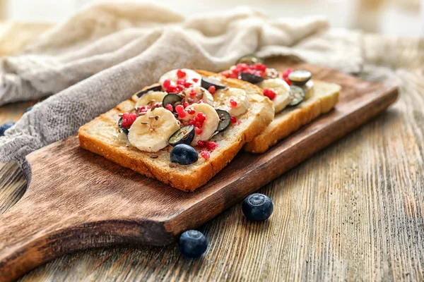 Tasty Sweet Toasts Fresh Sliced Banana Berries Wooden Board — Stock Photo, Image