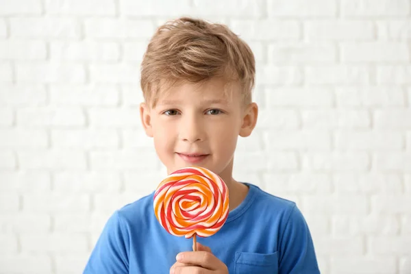 Cute Little Boy Lollipop White Brick Wall — Stock Photo, Image