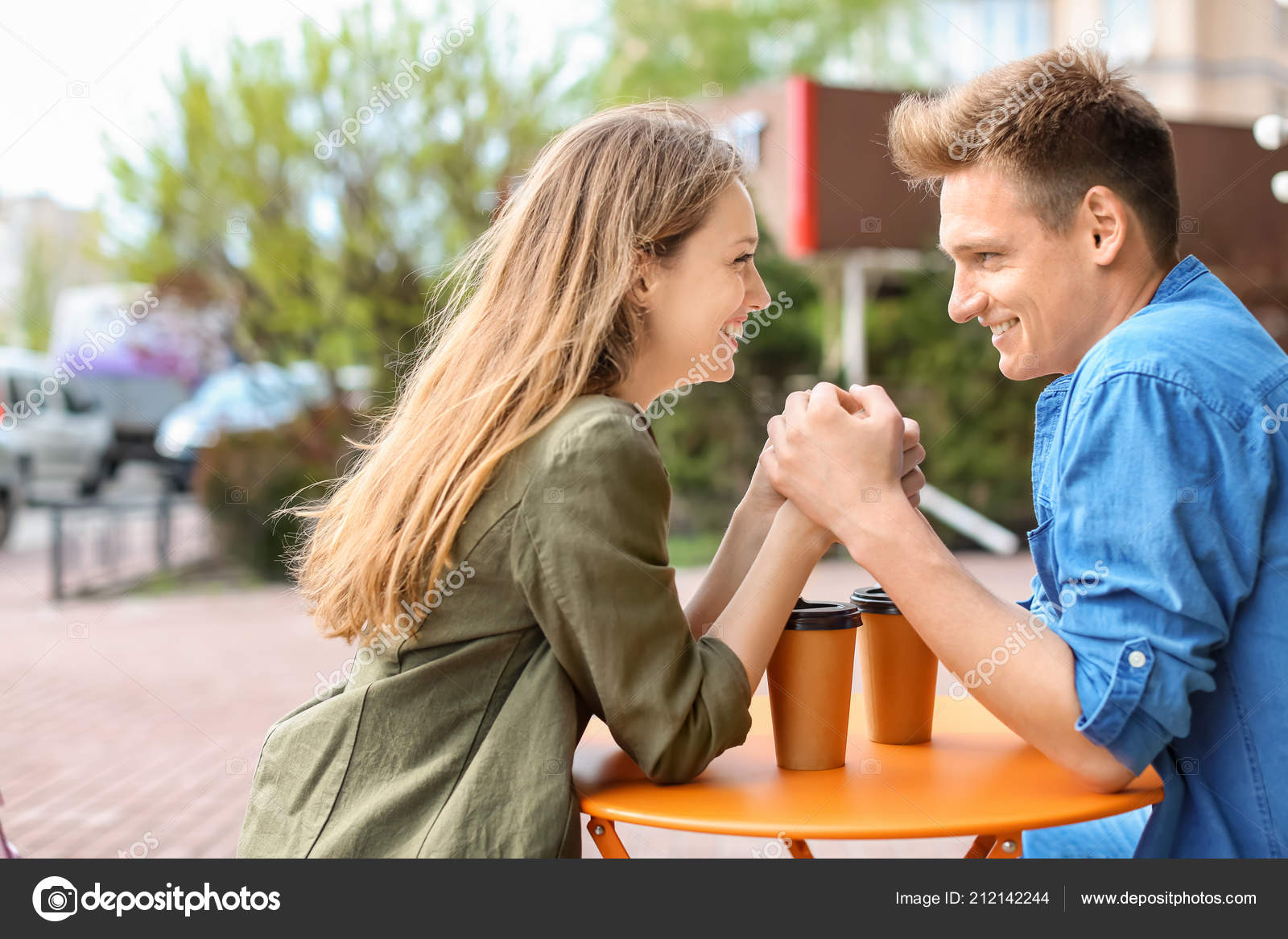 Happy Young Couple Cafe Outdoors — Stock Photo © serezniy 212142244