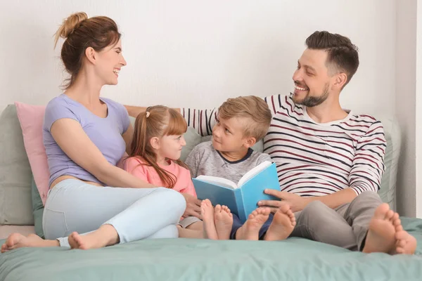 Happy Family Reading Book Together Home — Stock Photo, Image