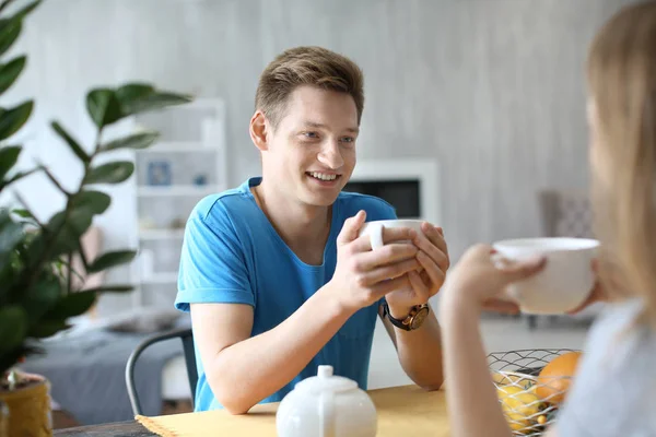 Happy Young Couple Drinking Hot Coffee Home — Stock Photo, Image