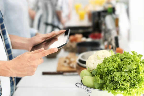 Young Man Tablet Reading Recipes Kitchen — Stock Photo, Image