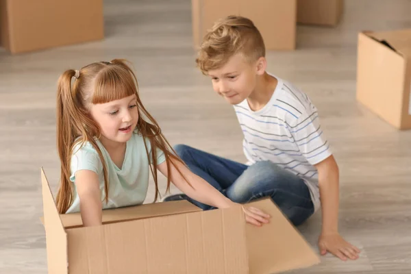 Cute Children Unpacking Box Moving New House — Stock Photo, Image