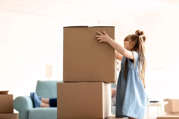 Cute Girl Stacking Cardboard Boxes Indoors Moving New House — Stock Photo, Image