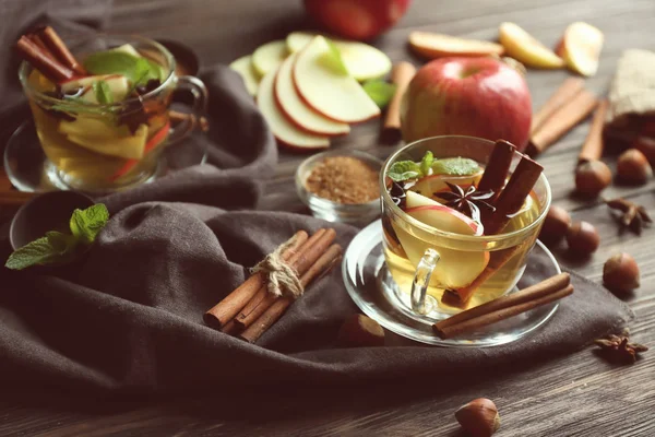 Cup Tea Cinnamon Apples Wooden Table — Stock Photo, Image