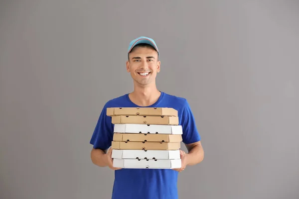 Young Man Pizza Boxes Grey Background Food Delivery Service — Stock Photo, Image