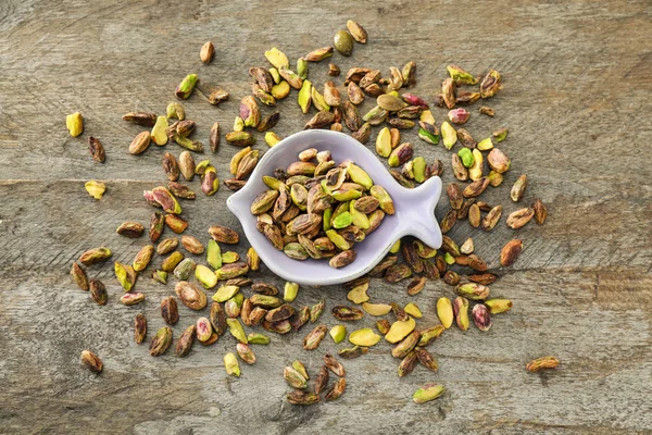 Plate Fresh Tasty Pistachio Nuts Wooden Background — Stock Photo, Image