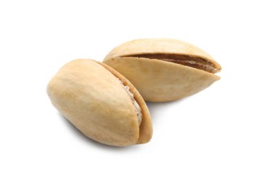 Beyaz zemin üzerine lezzetli fıstık fındık