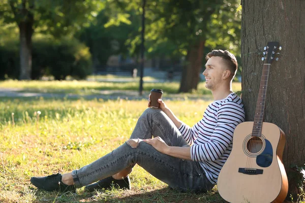 Handsome Man Cup Coffee Guitar Resting Park — Stock Photo, Image