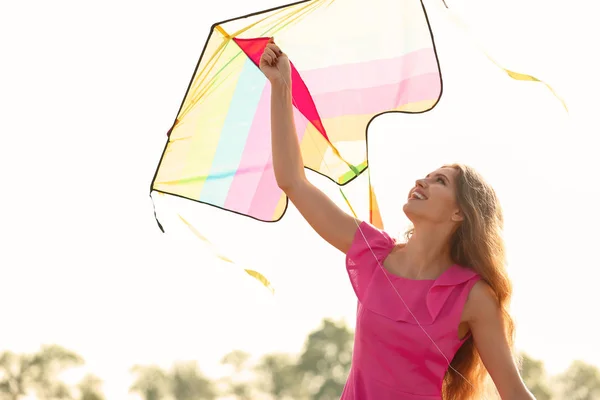 Beautiful Young Woman Flying Kite Outdoors — Stock Photo, Image