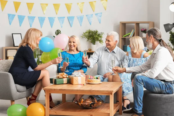 Mature People Celebrating Birthday Champagne Indoors — Stock Photo, Image