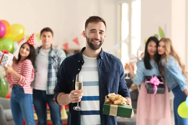 Young Man Gift Box Glass Champagne Birthday Party Indoors — Stock Photo, Image