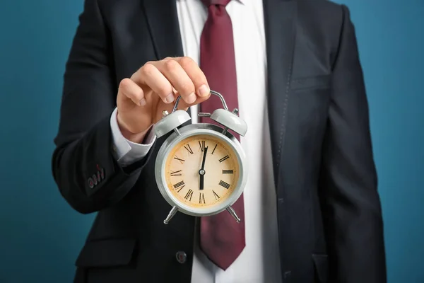 Businessman Holding Alarm Clock Color Background Time Management Concept — Stock Photo, Image