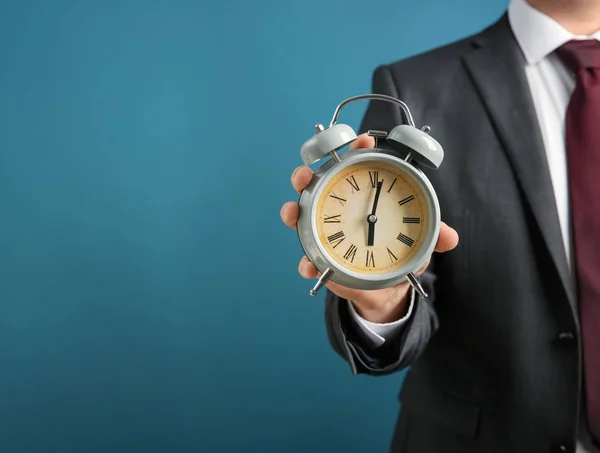 Businessman Holding Alarm Clock Color Background Time Management Concept — Stock Photo, Image
