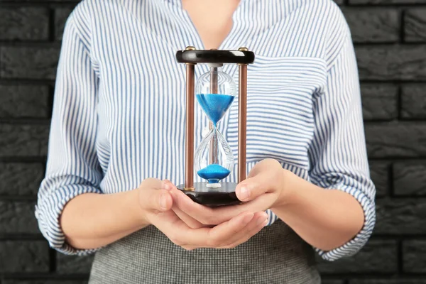 Woman Hourglass Brick Wall Closeup Time Management Concept — Stock Photo, Image
