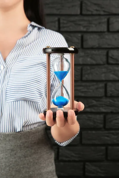 Woman Hourglass Brick Wall Time Management Concept — Stock Photo, Image