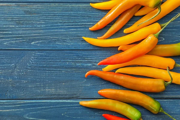 Fresh Chili Peppers Color Wooden Background — Stock Photo, Image