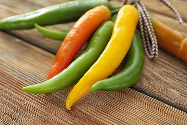 Fresh Chili Peppers Wooden Background — Stock Photo, Image