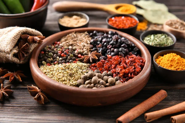 Bowls Different Dry Spices Wooden Background — Stock Photo, Image