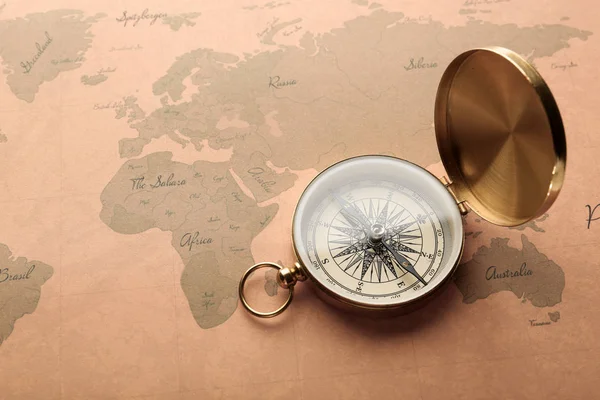 Złoty Kompas Mapie Świata Vintage Koncepcja Planowania Podróży — Zdjęcie stockowe