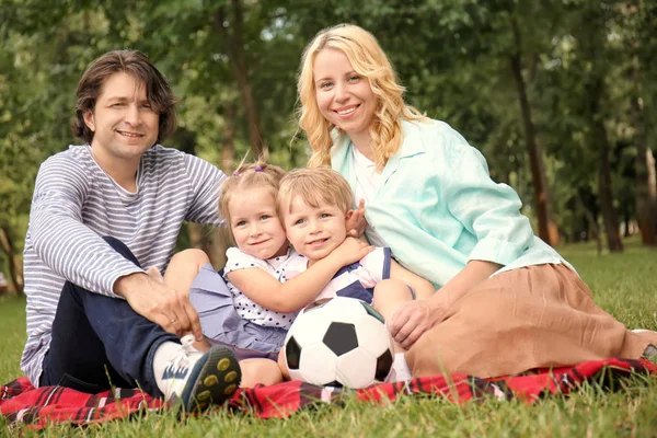 Happy Family Resting Plaid Park — Stock Photo, Image