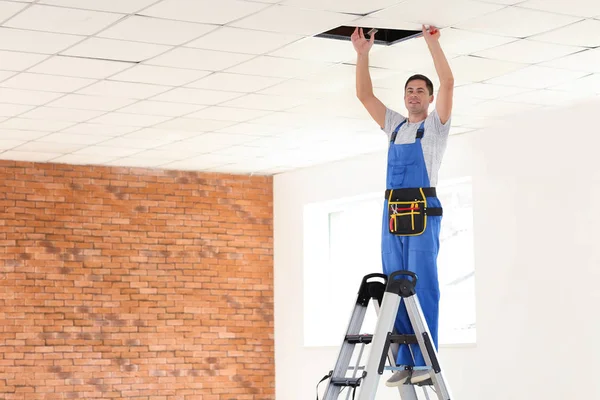 Electrician Extending Wiring Ceiling Indoors — Stock Photo, Image