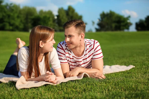 Young Couple Lying Plaid Outdoors — Stock Photo, Image