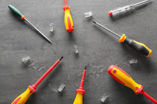 Different Screwdrivers Grey Background — Stock Photo, Image