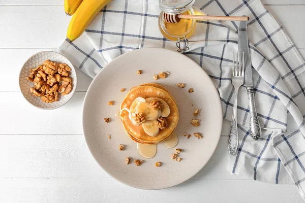 Plate Tasty Pancakes Walnuts Sliced Banana Table — Stock Photo, Image